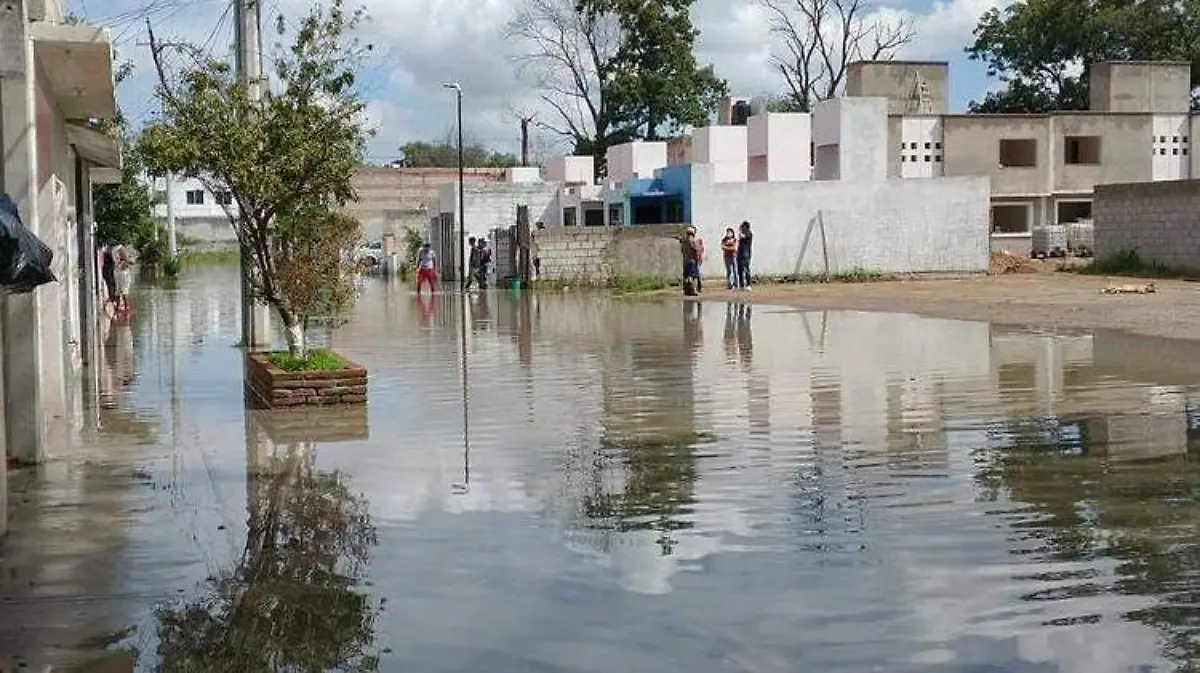 Casas bajo el agua por desbordamiento del Río San Juan